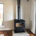 wood fireplace installed in living room - gas fitter Ballina, NSW